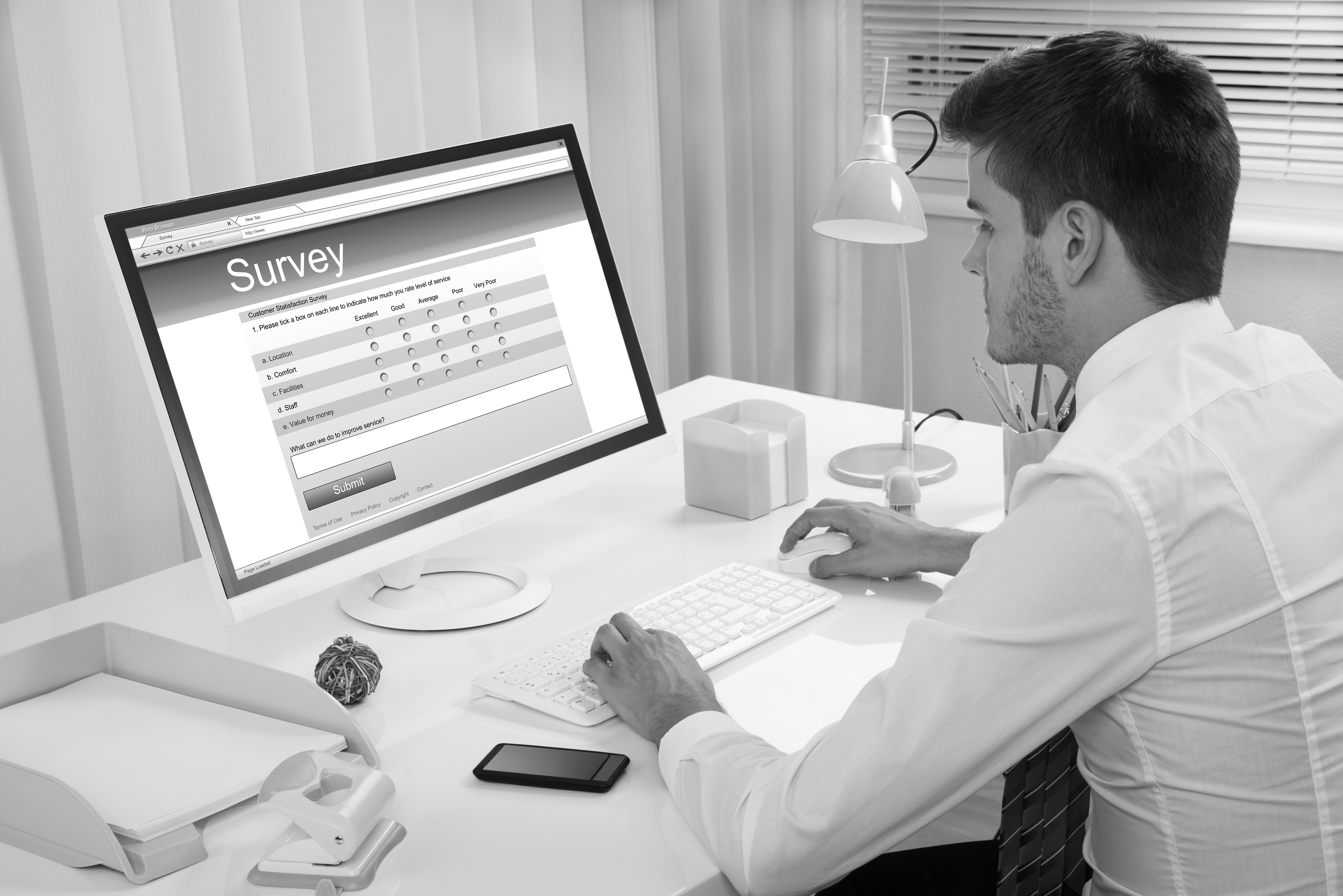 Businessman Filling Online Survey Form On Computer